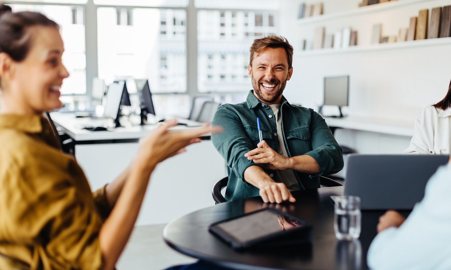 Business people having a team meeting in an office